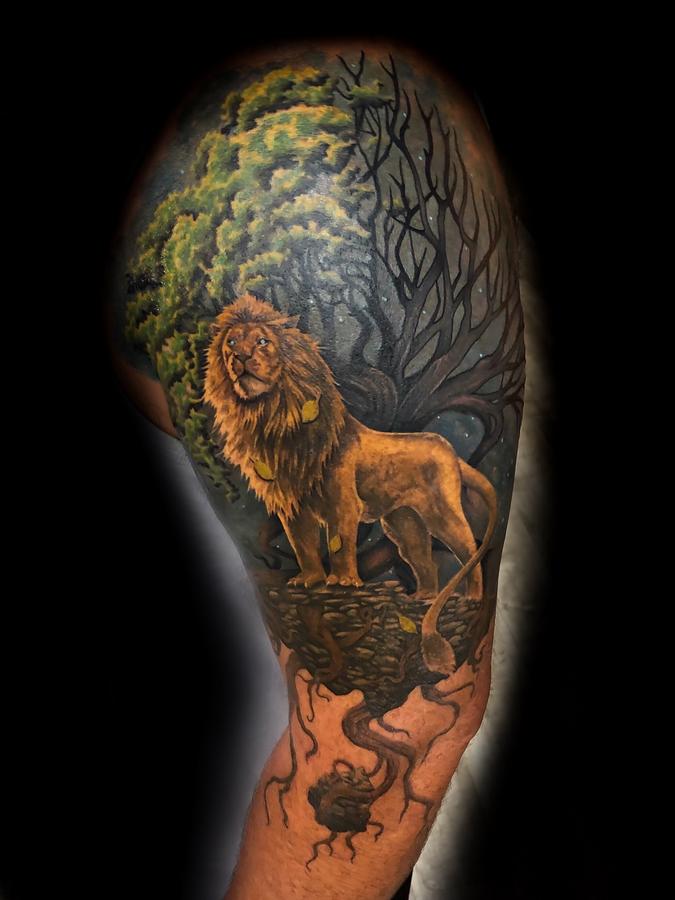 Realistic Color Lion Portrait tattoo made by Giena Revess a traveling Tattoo  Artist Sleeve Tattoo  Mens lion tattoo Lion tattoo Wildlife tattoo